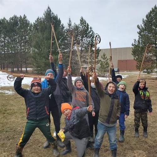 Students Enjoying Baaga'adowewin (Lacrosse) During Culture Camp