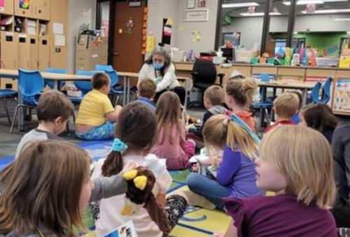 Nookomis Reading to West Elementary Students