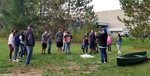 RJEMS Learning About Bawa'am (s/he knocks wild rice) at our Manoominikwewin (ricing) Culture Camp