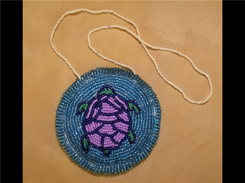 Mikinaak Medallion
